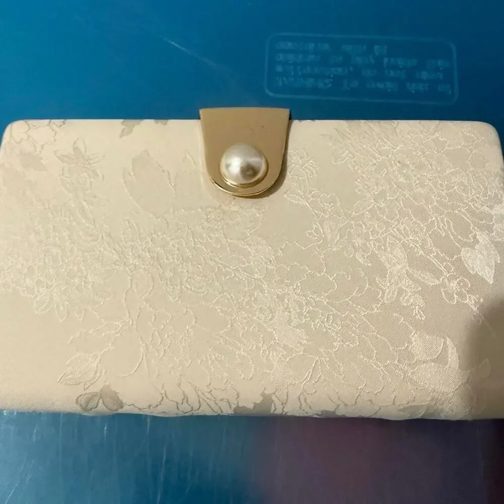 Estee & Lilly cream and white floral clutch bag with gold and pearl accents